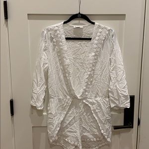 White long sleeved romper with white lace